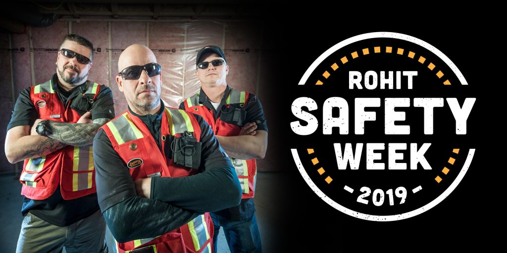 Rohit Safety Week graphic with 3 construction workers in safety vests standing with crossed arms.