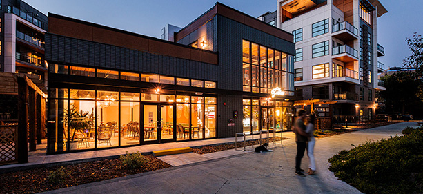 Photo of building at night with glowing interior